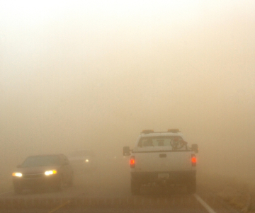 How do sand or dust storms occur? 
